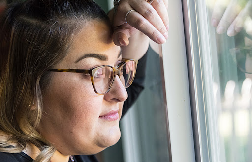 girl stare at window